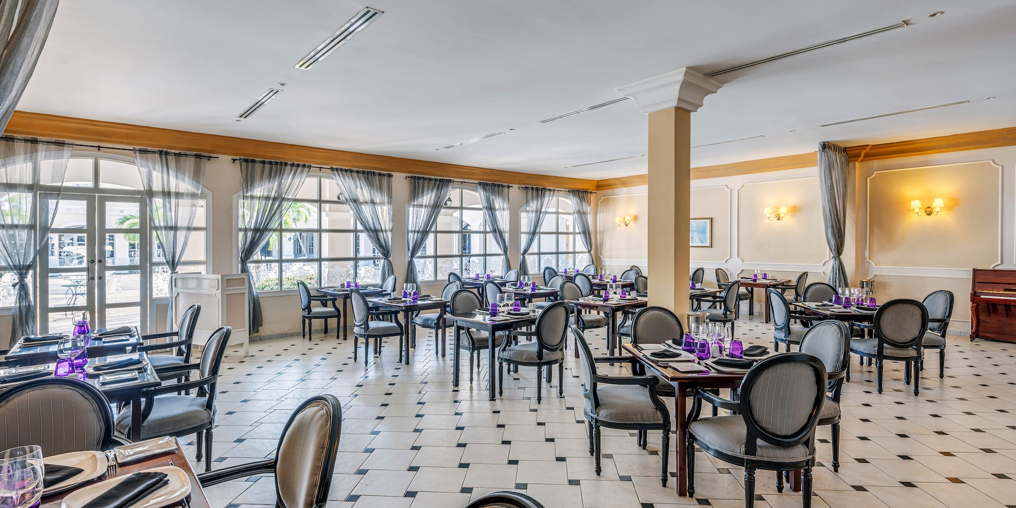 a room with tables and chairs