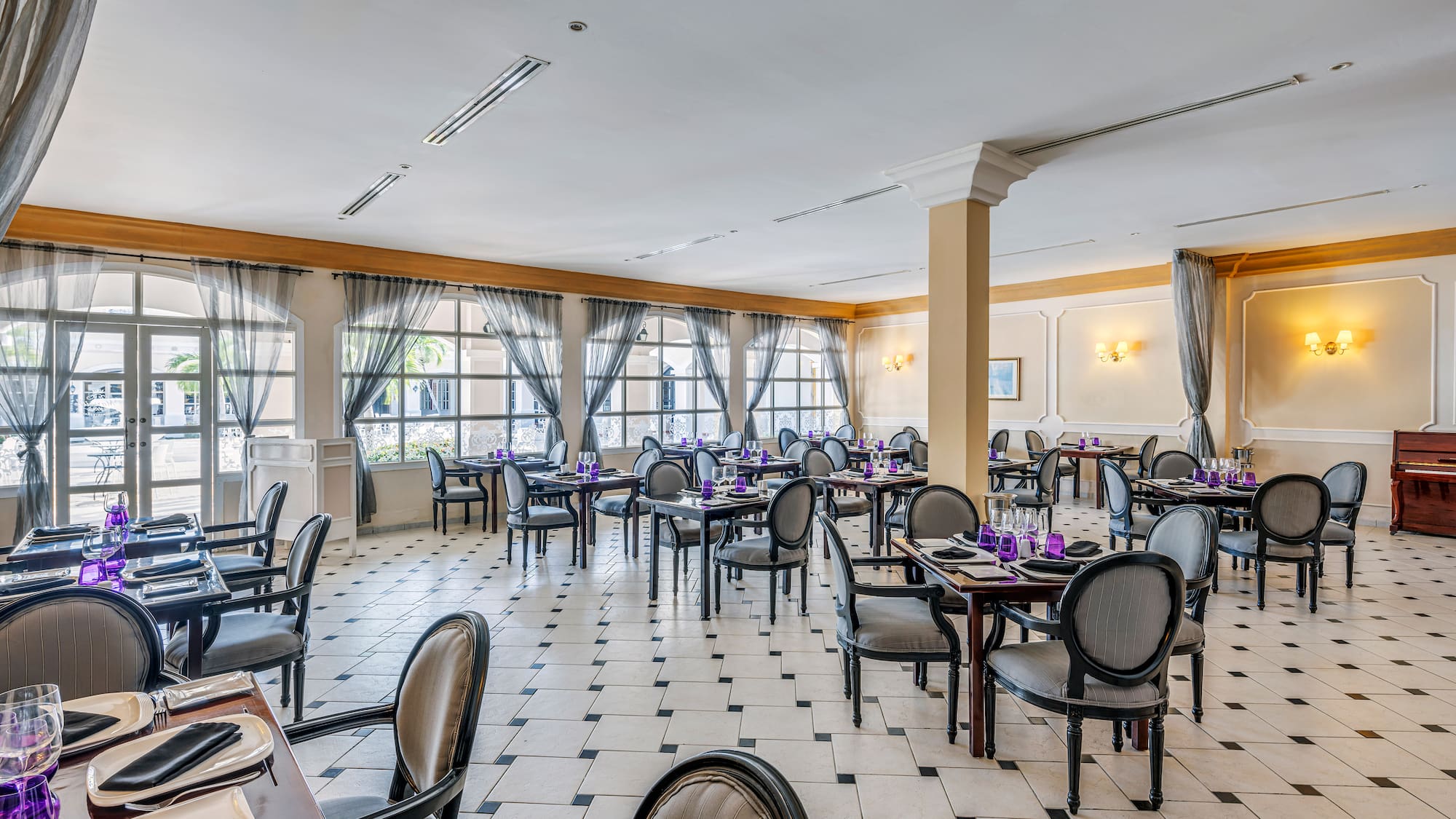 a room with tables and chairs