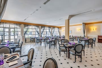 a room with tables and chairs