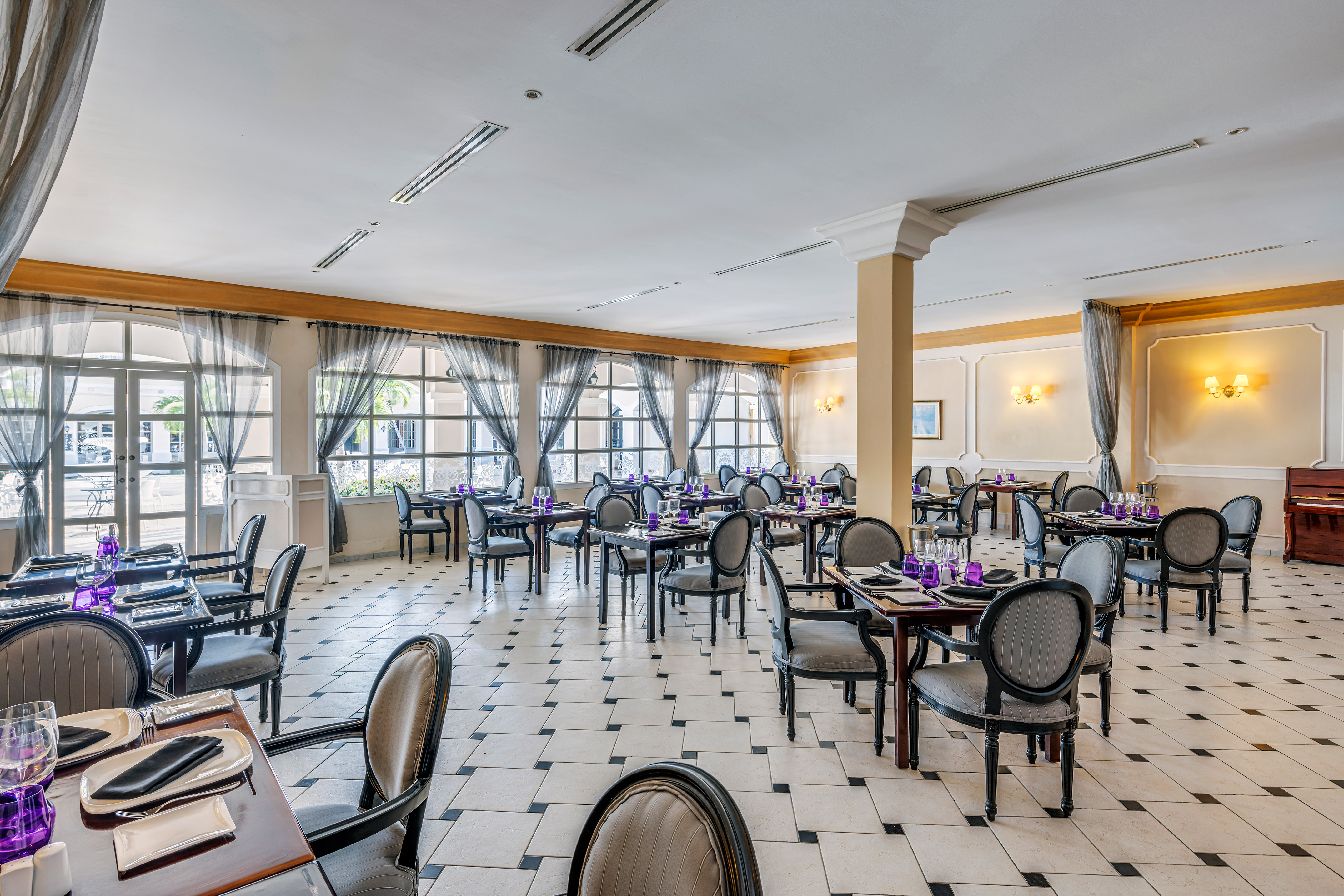 a room with tables and chairs