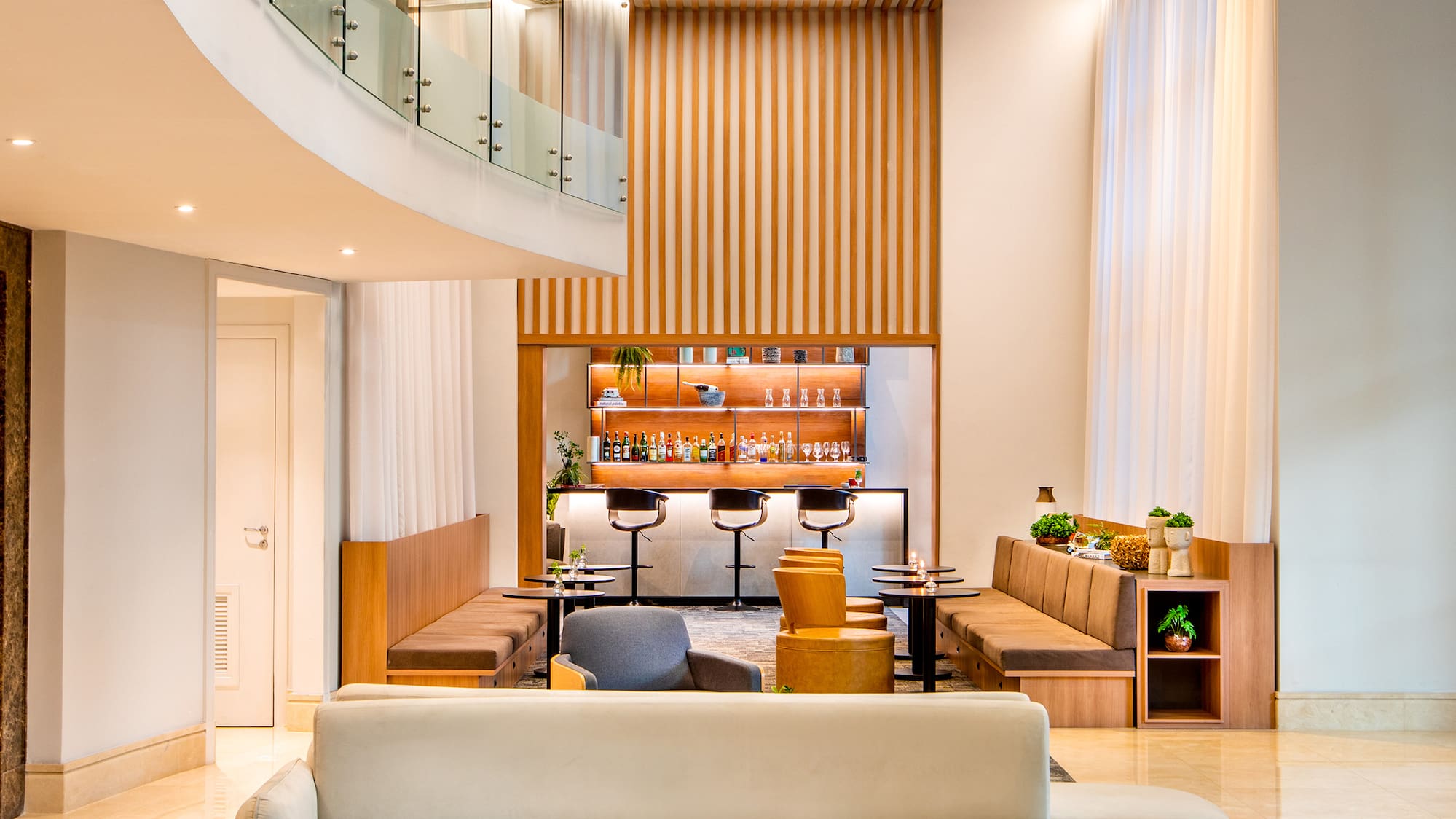 a room with a couch and a bar