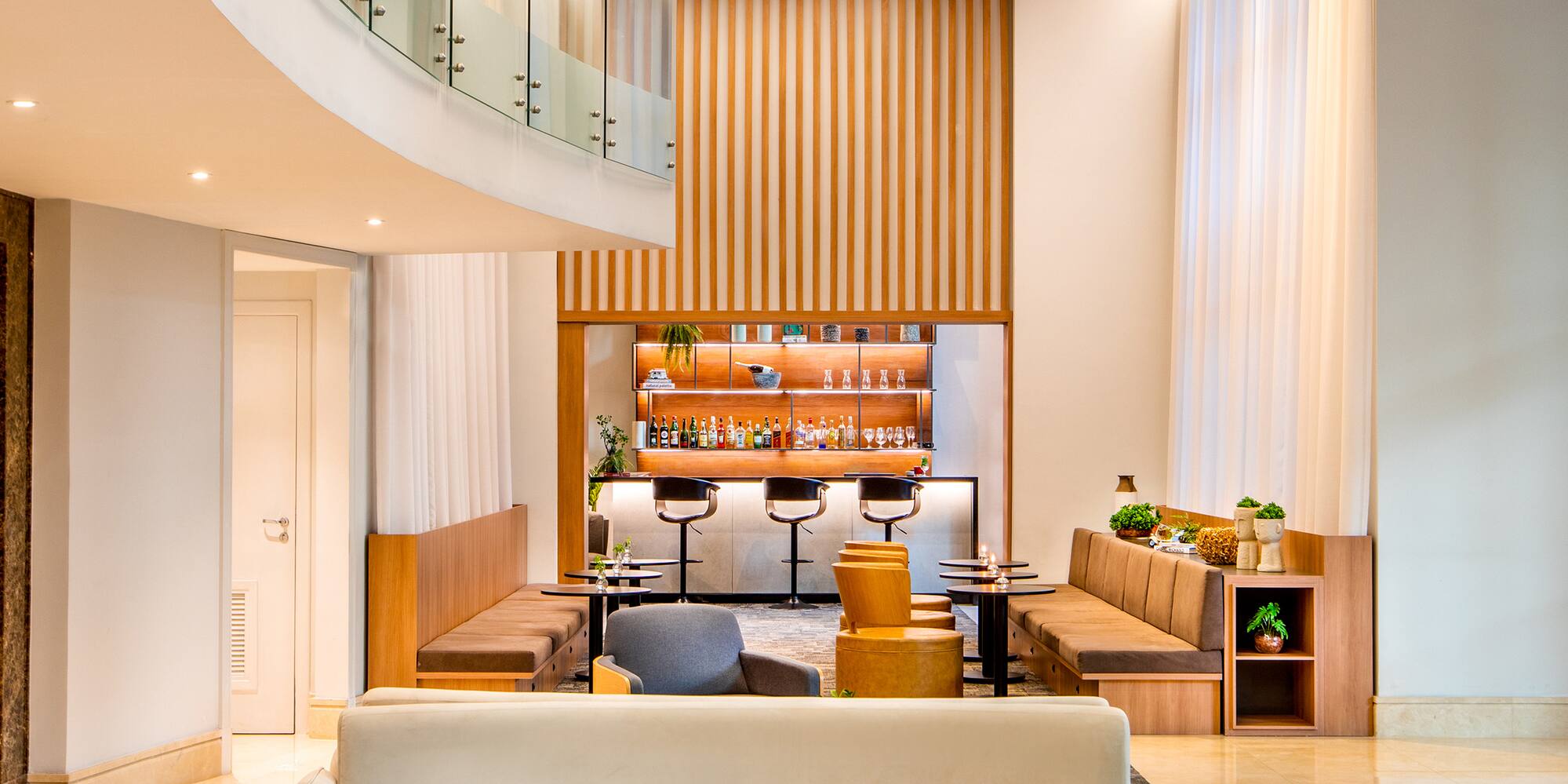 a room with a couch and a bar