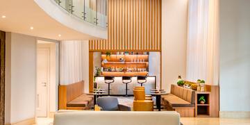 a room with a couch and a bar