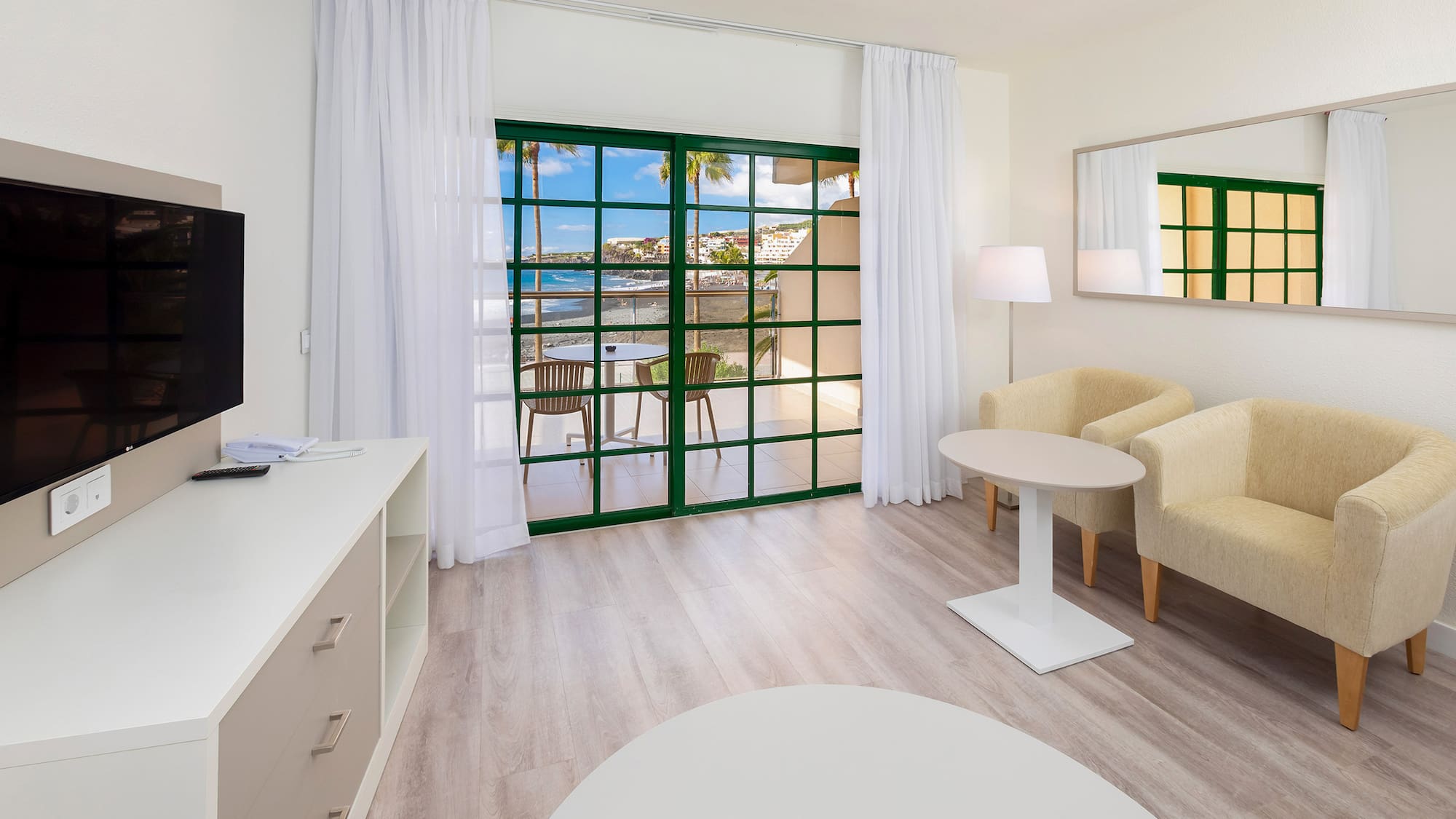 a room with a television and a table