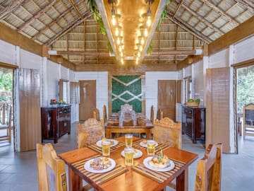 a room with a table and chairs