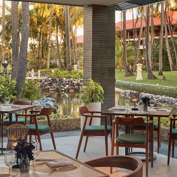 a restaurant with tables and chairs