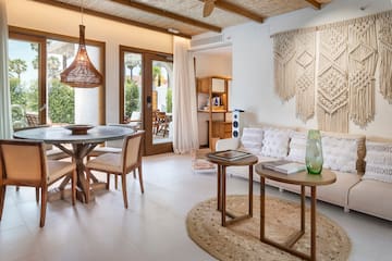 a living room with a couch and table