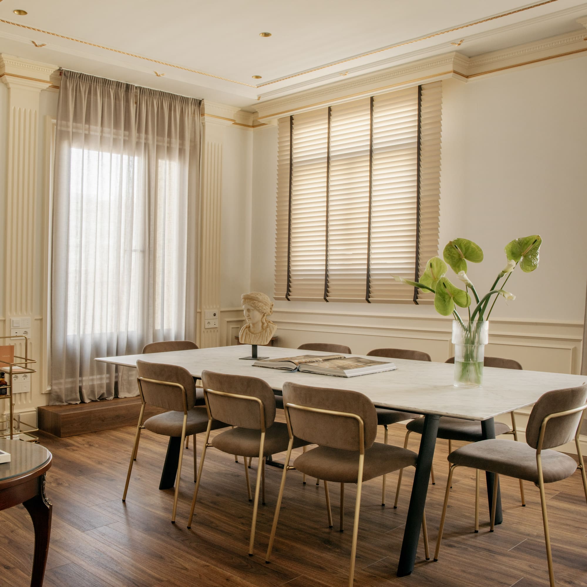 a room with a table and chairs