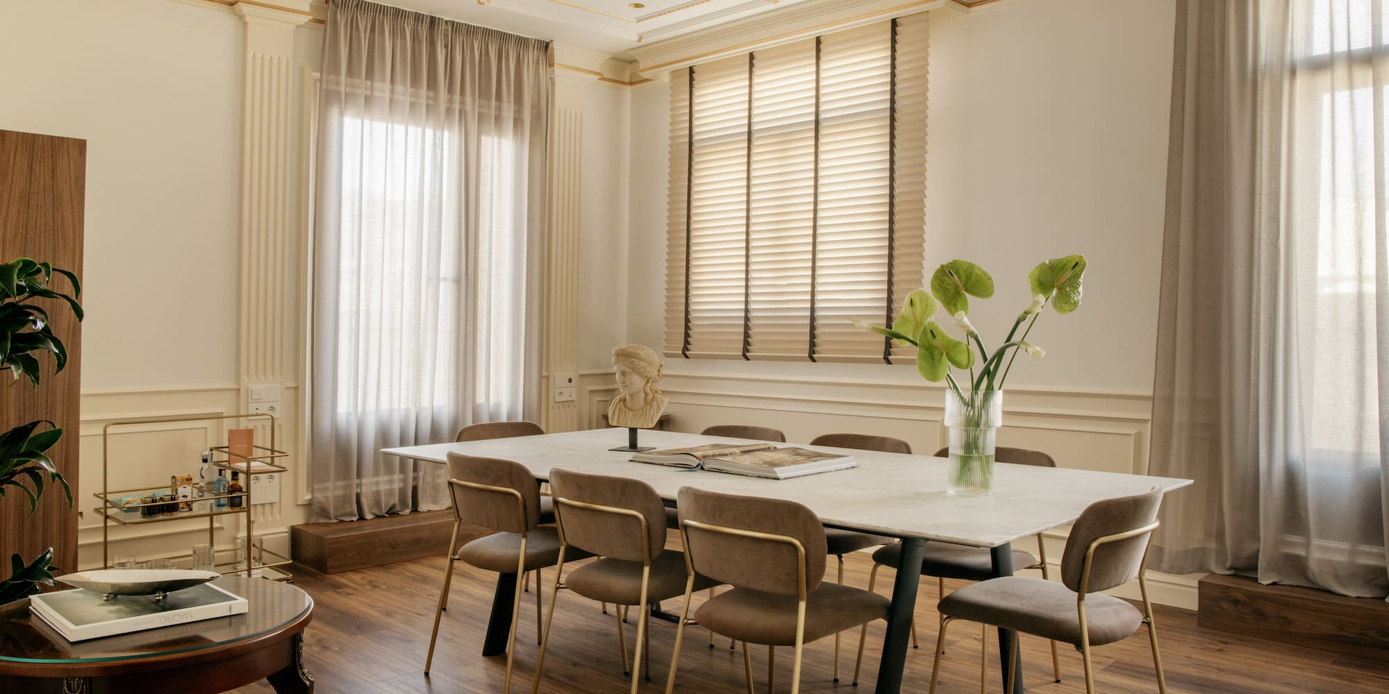 a room with a table and chairs