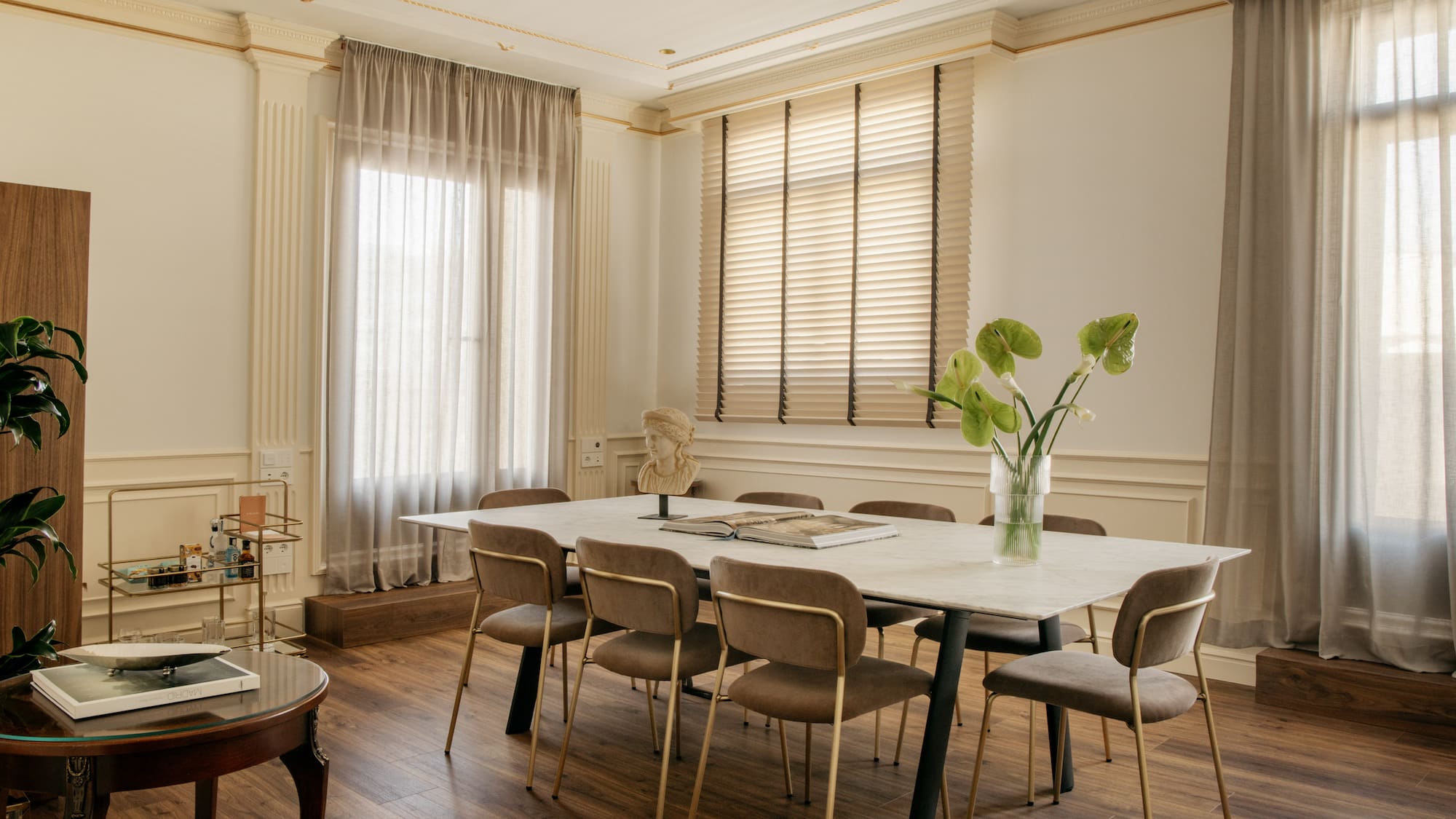 a room with a table and chairs