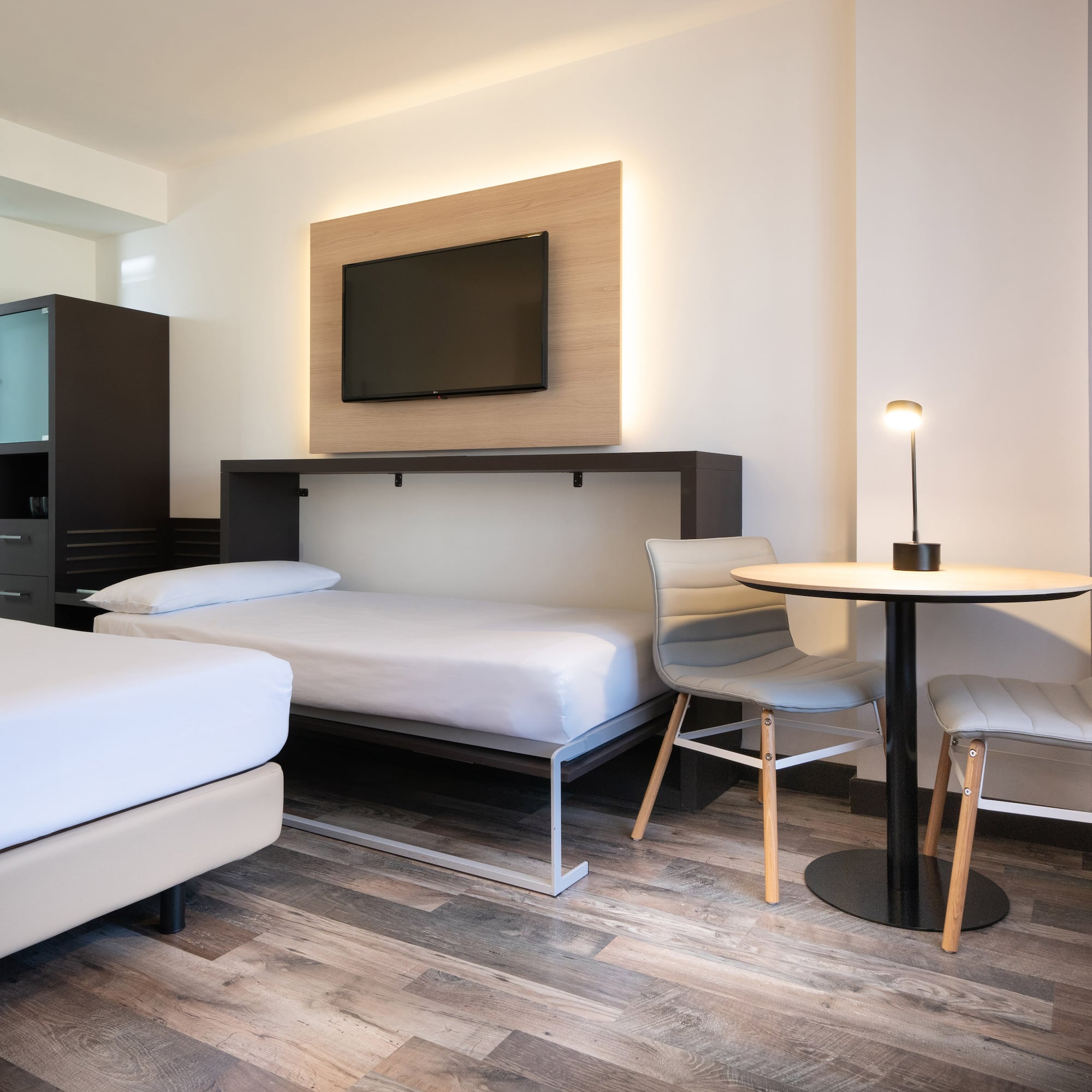 a room with a tv and a table