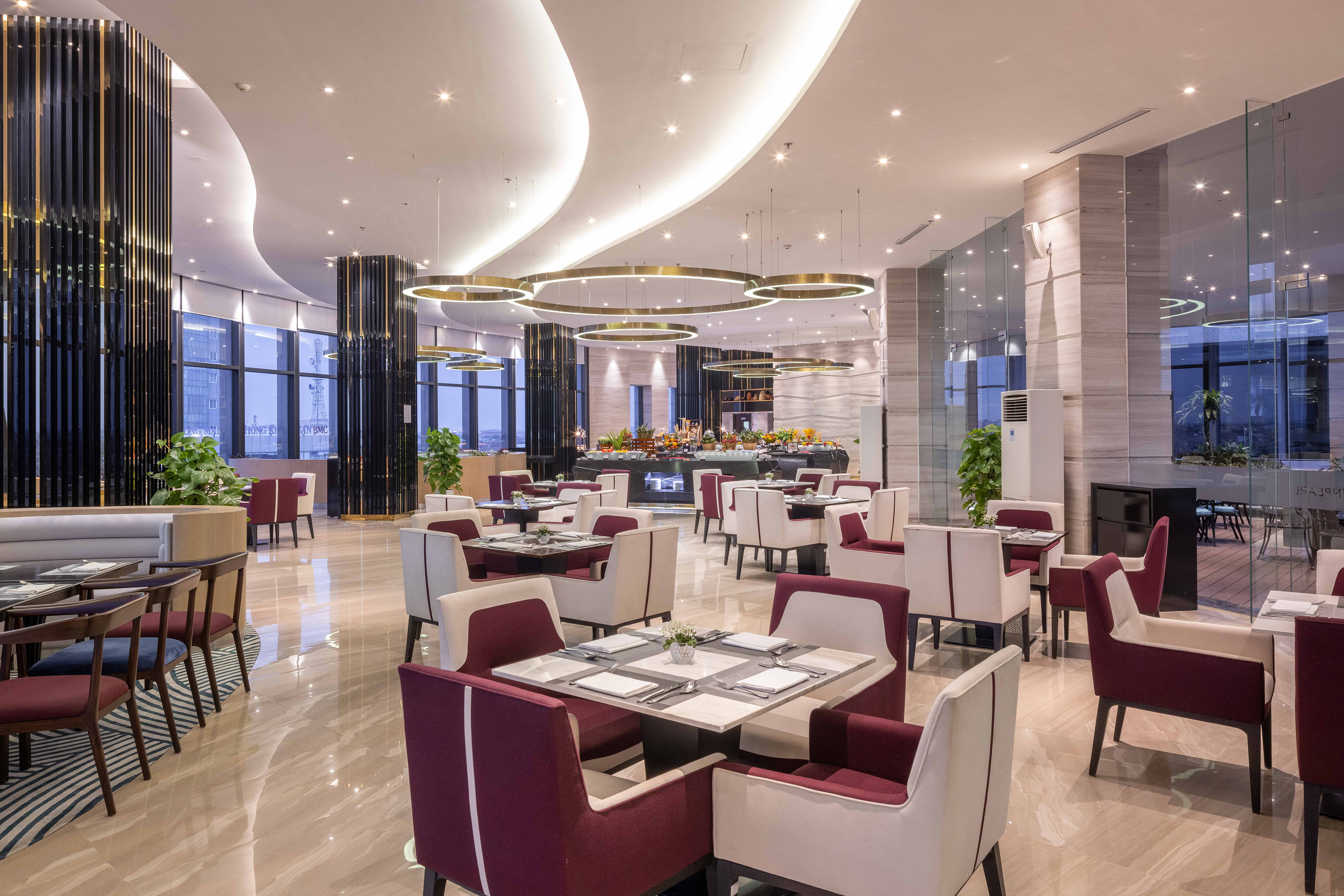 a restaurant with tables and chairs
