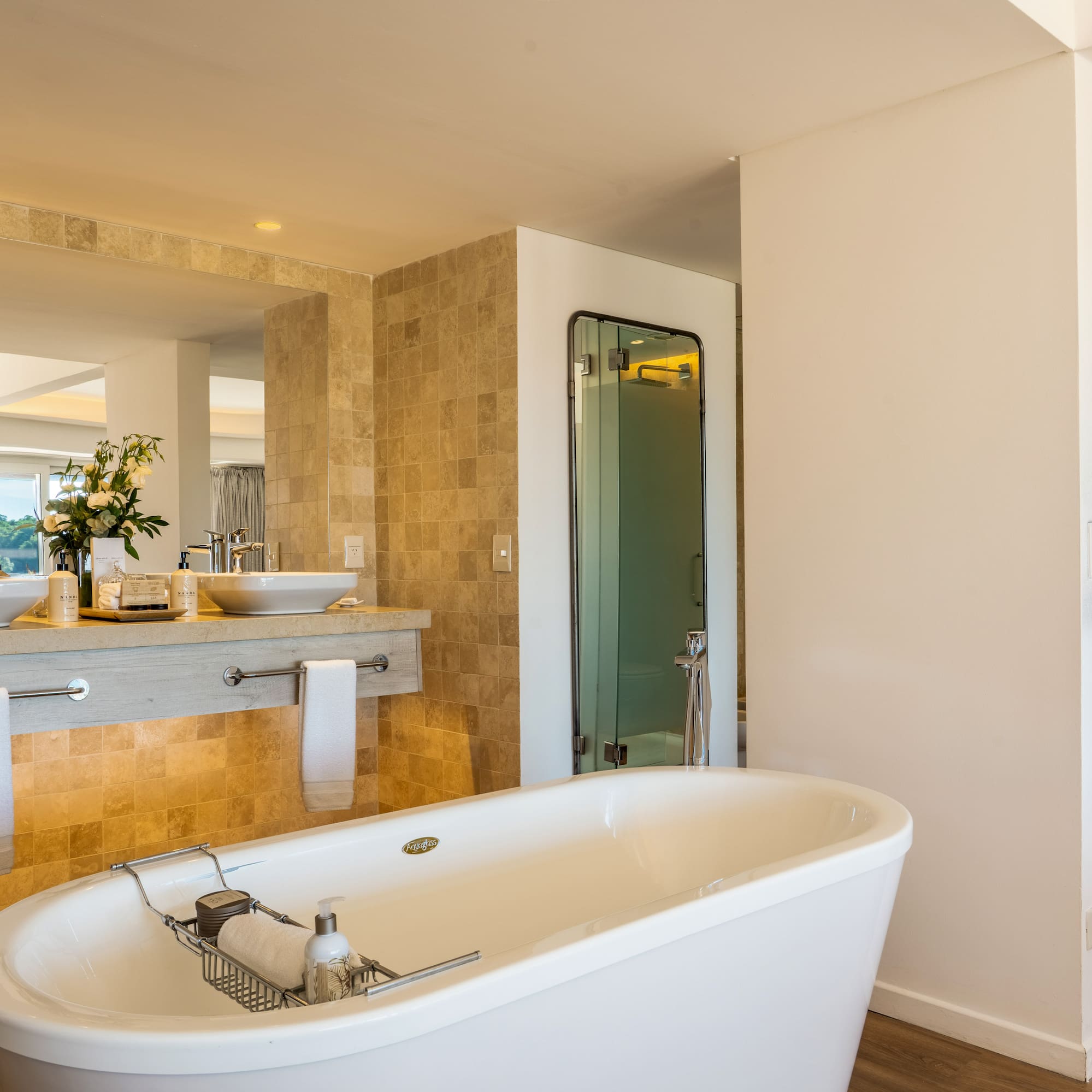 a bathroom with a tub and sink