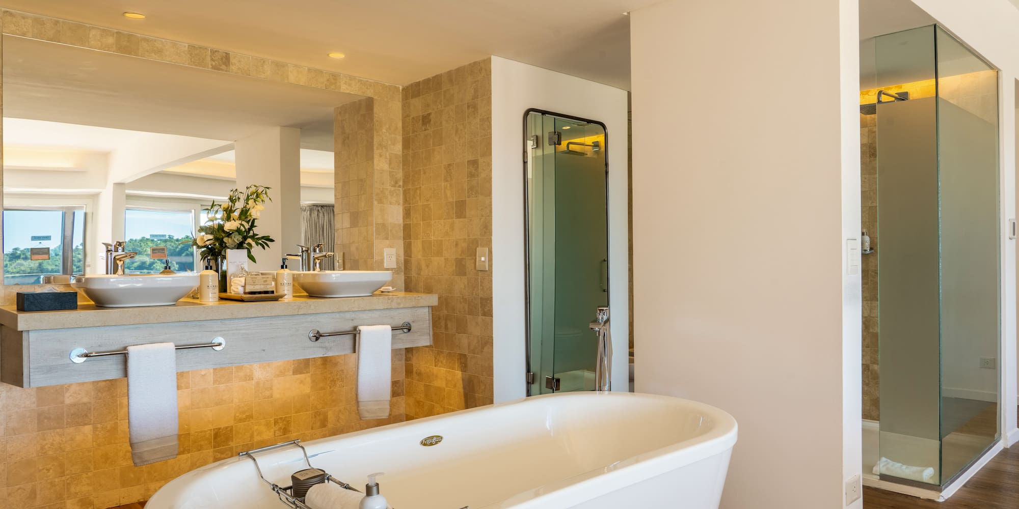 a bathroom with a tub and sink