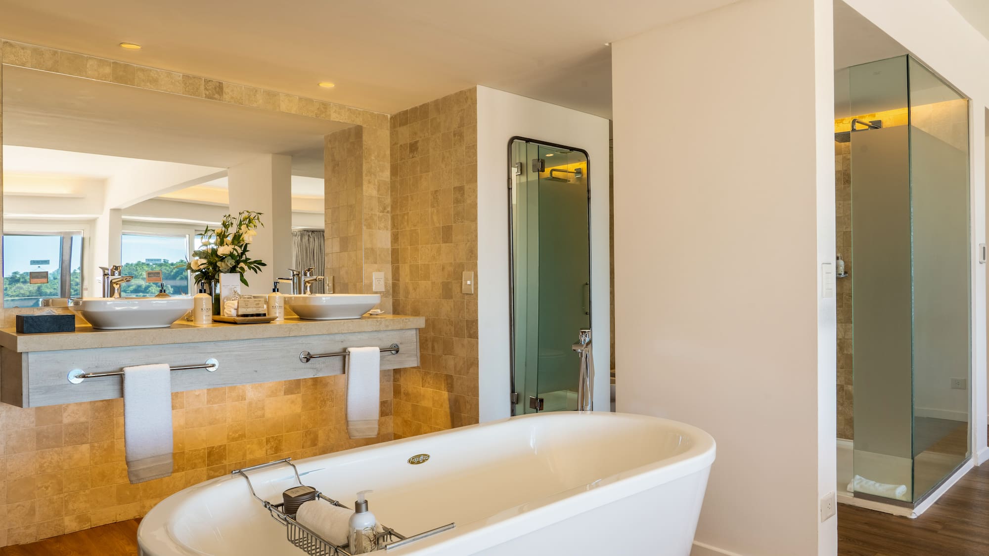 a bathroom with a tub and sink