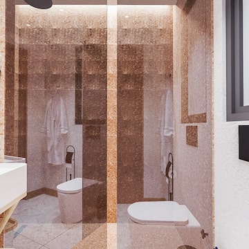 a bathroom with a glass shower door