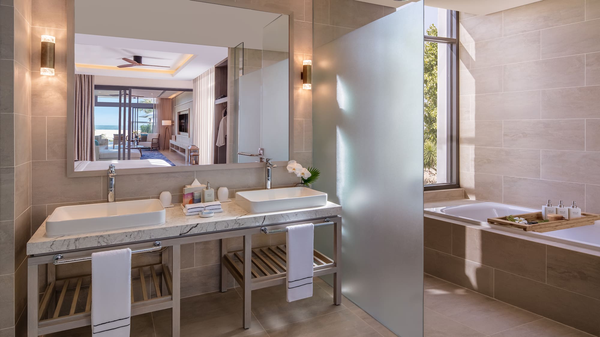 a bathroom with a large mirror and sink