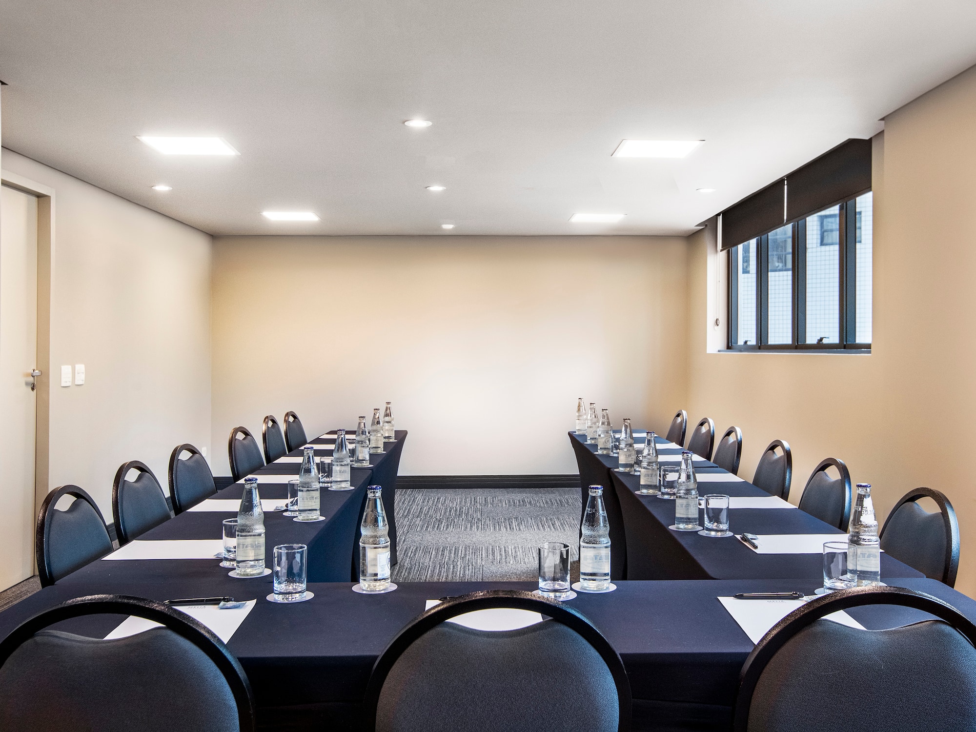 a room with tables and chairs