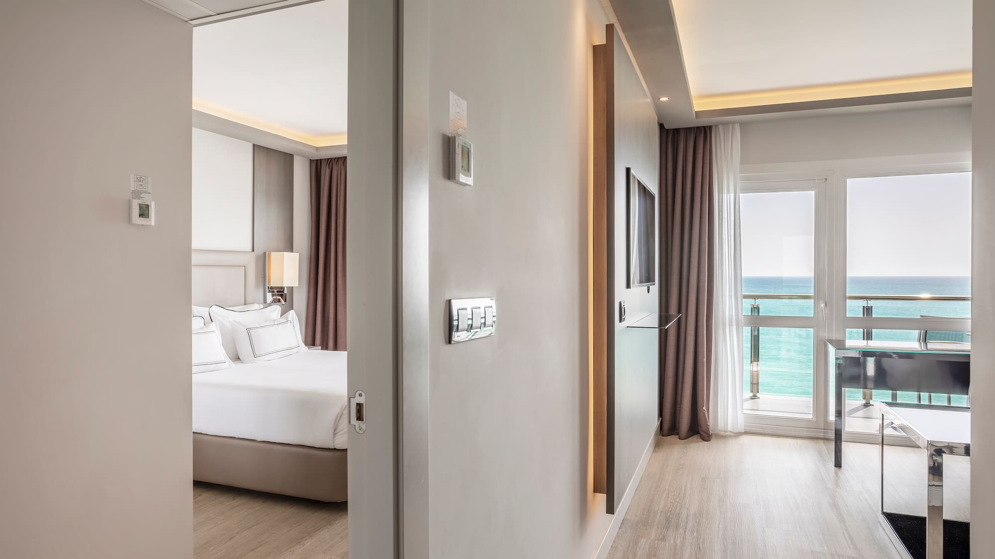 a room with a bed and a door