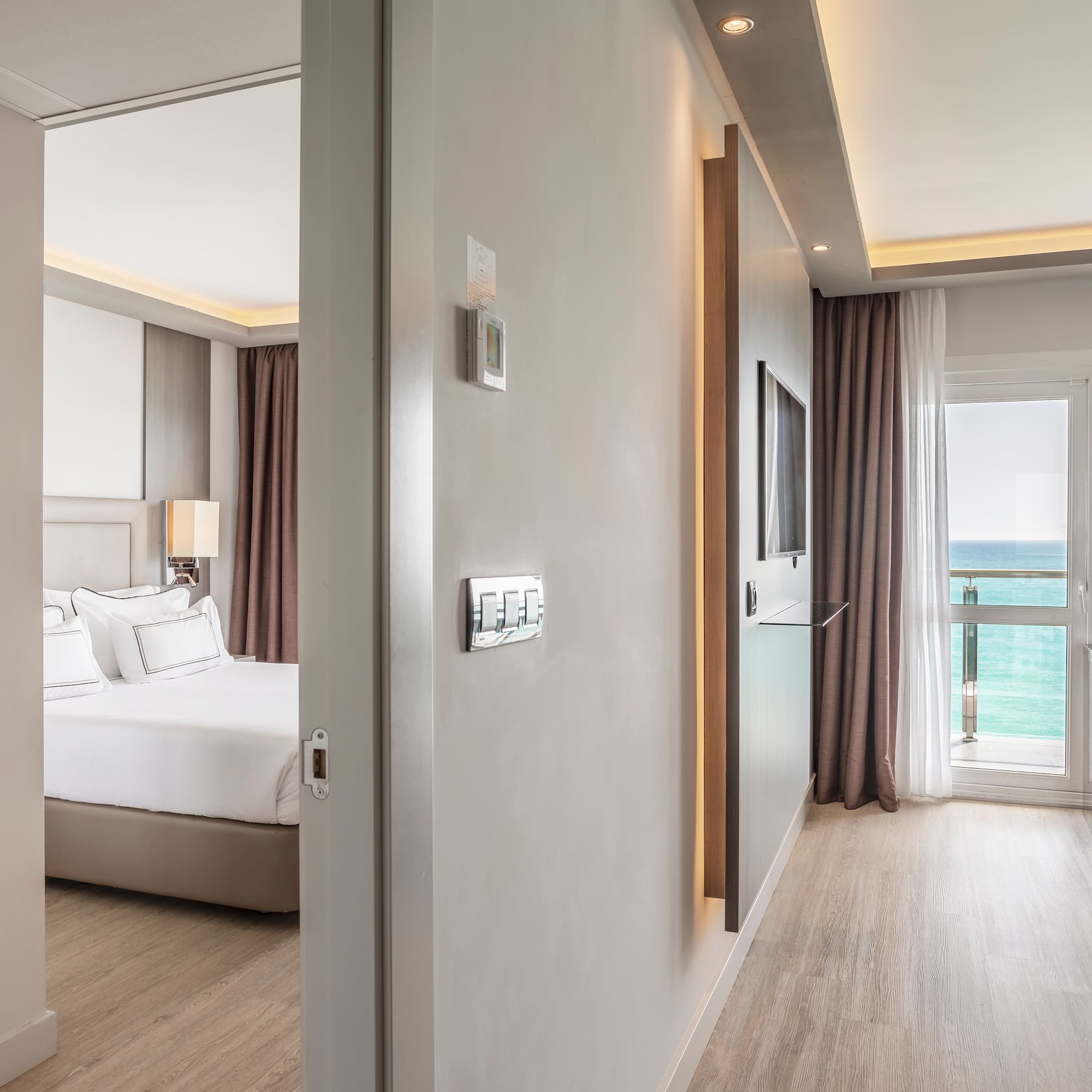 a room with a bed and a door