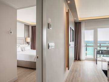 a room with a bed and a door