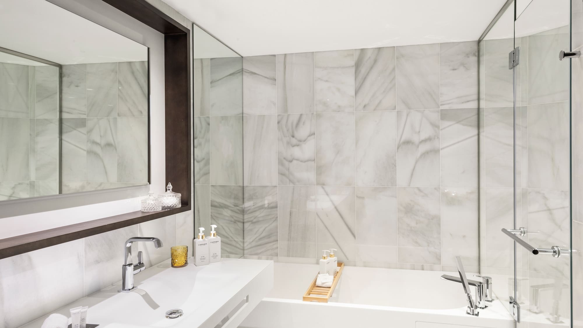 a bathroom with a bathtub and sink