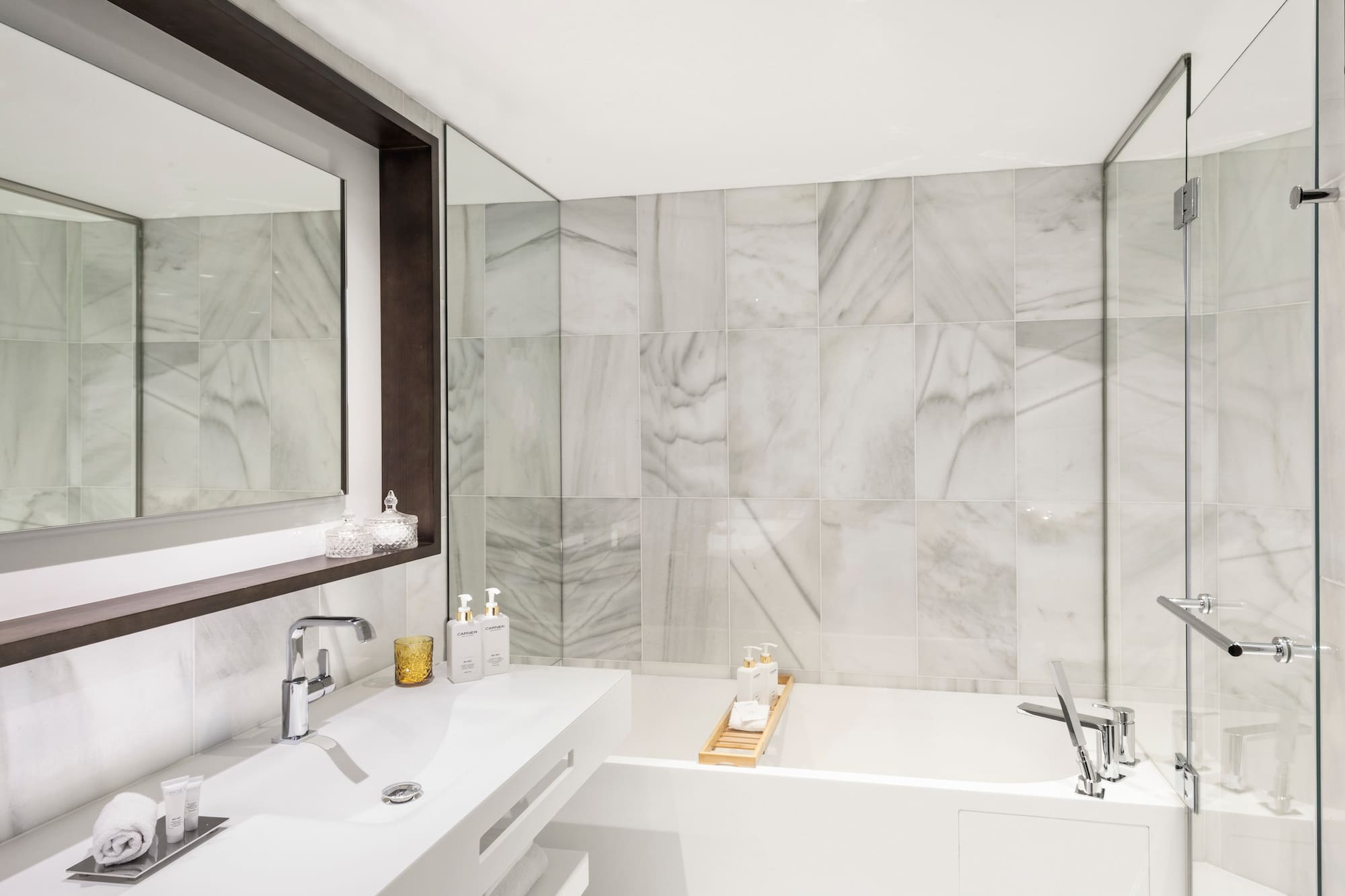 a bathroom with a bathtub and sink