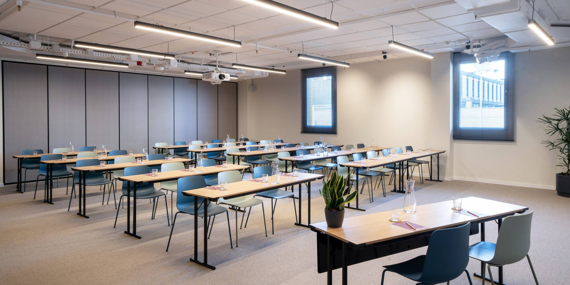 a room with tables and chairs