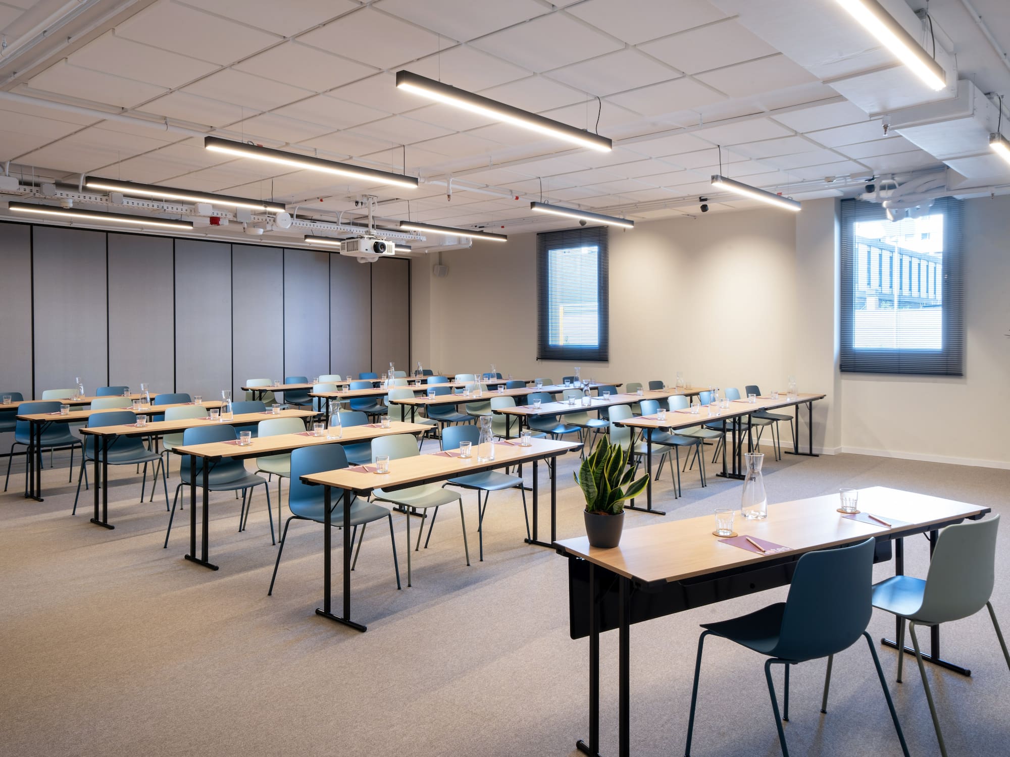 a room with tables and chairs