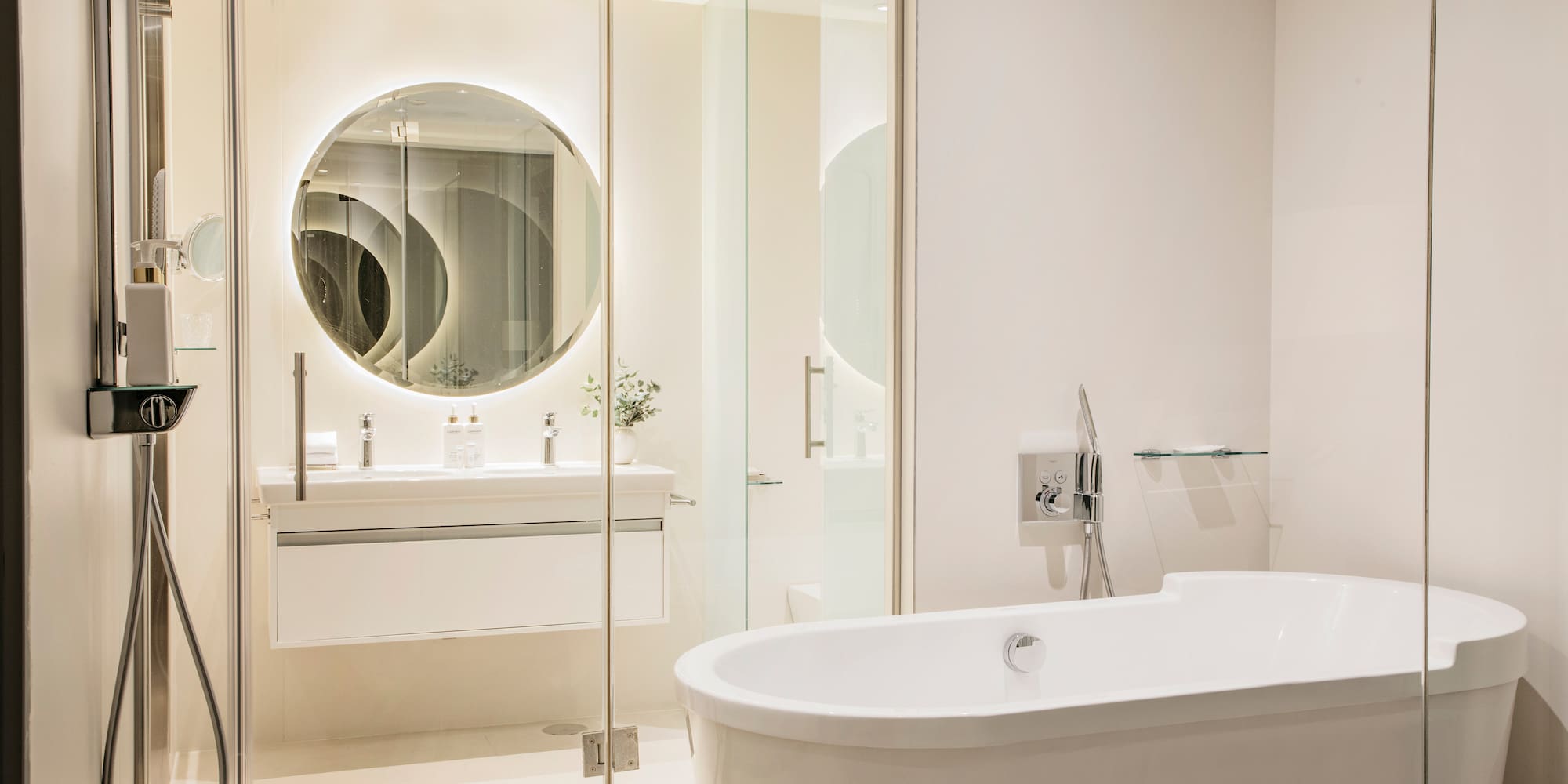 a bathroom with a tub and a mirror