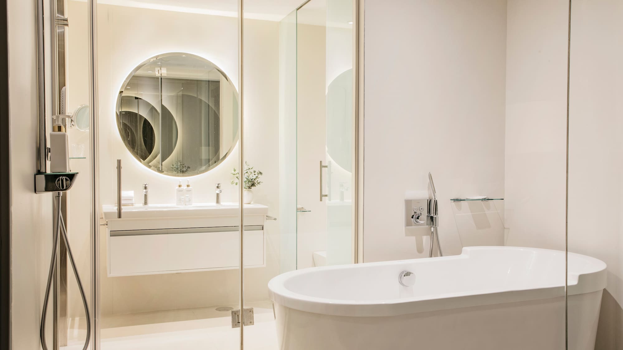a bathroom with a tub and a mirror