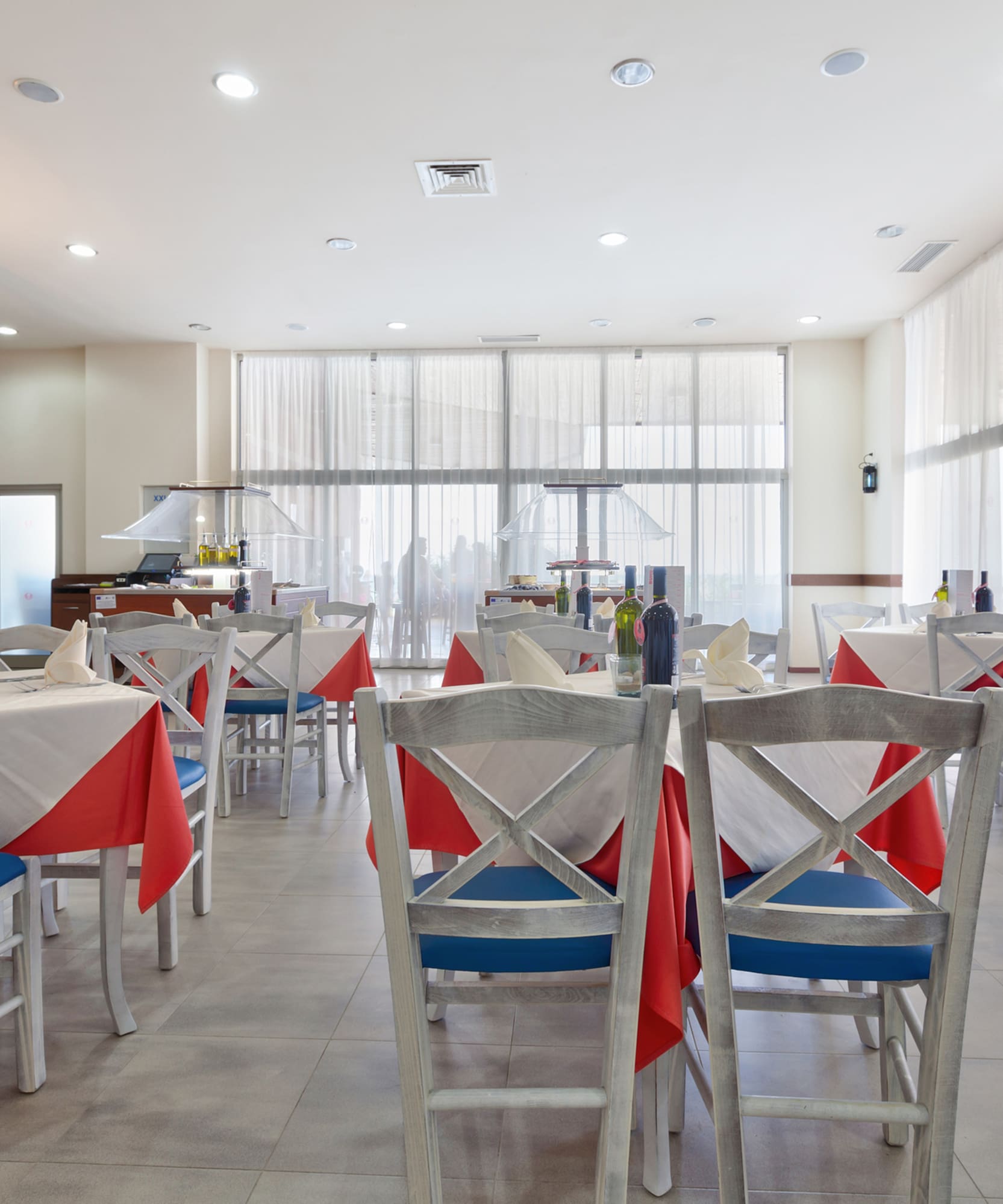 a room with tables and chairs