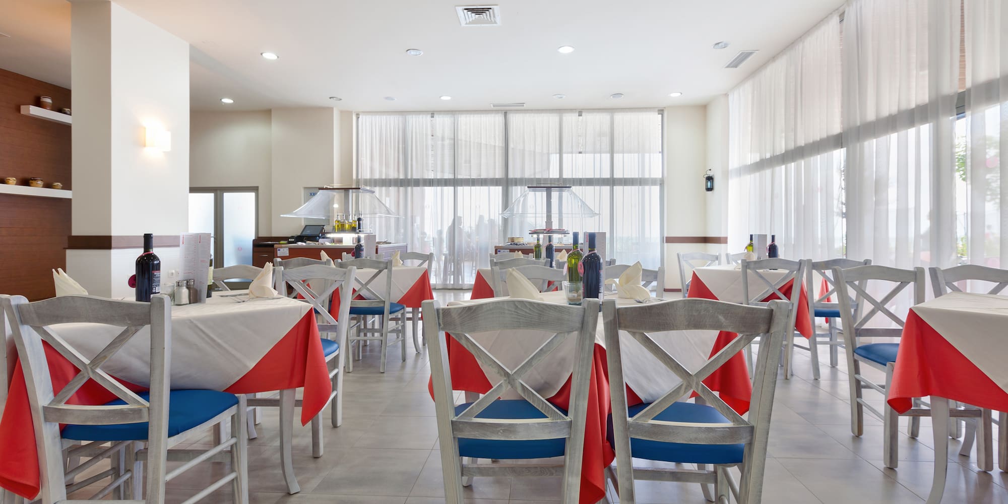 a room with tables and chairs