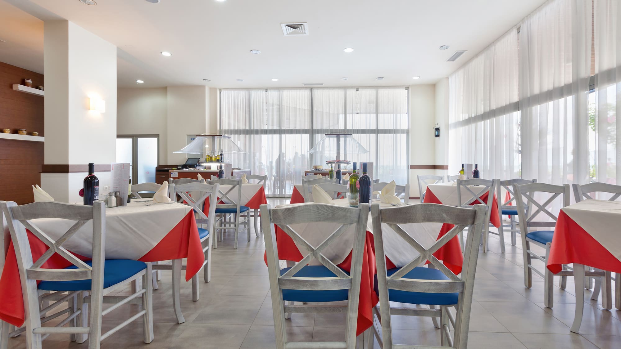 a room with tables and chairs