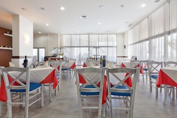 a room with tables and chairs