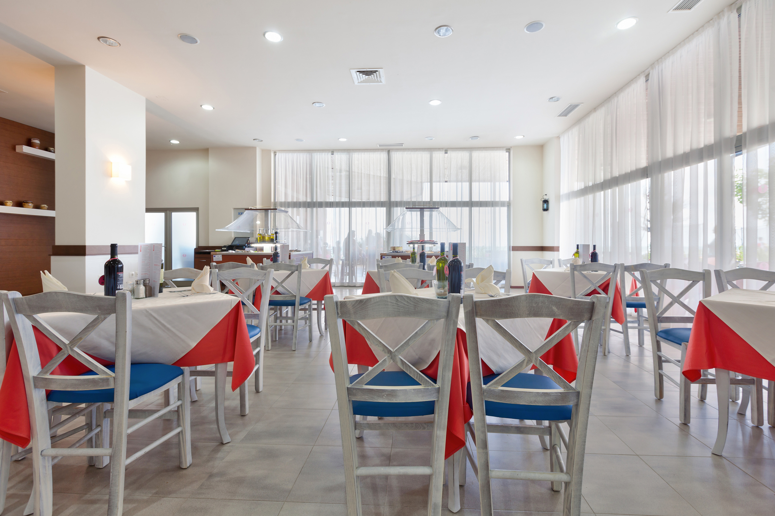 a room with tables and chairs