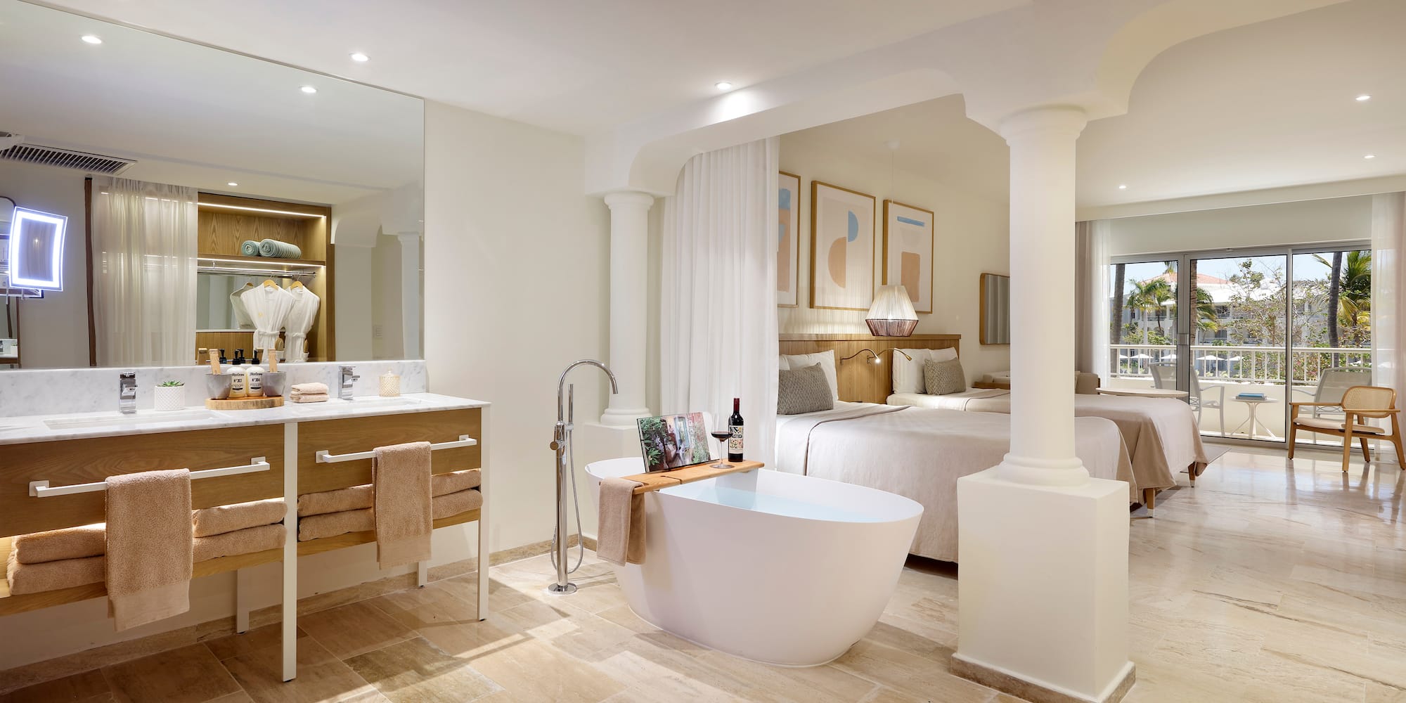 a bathroom with a tub and a sink