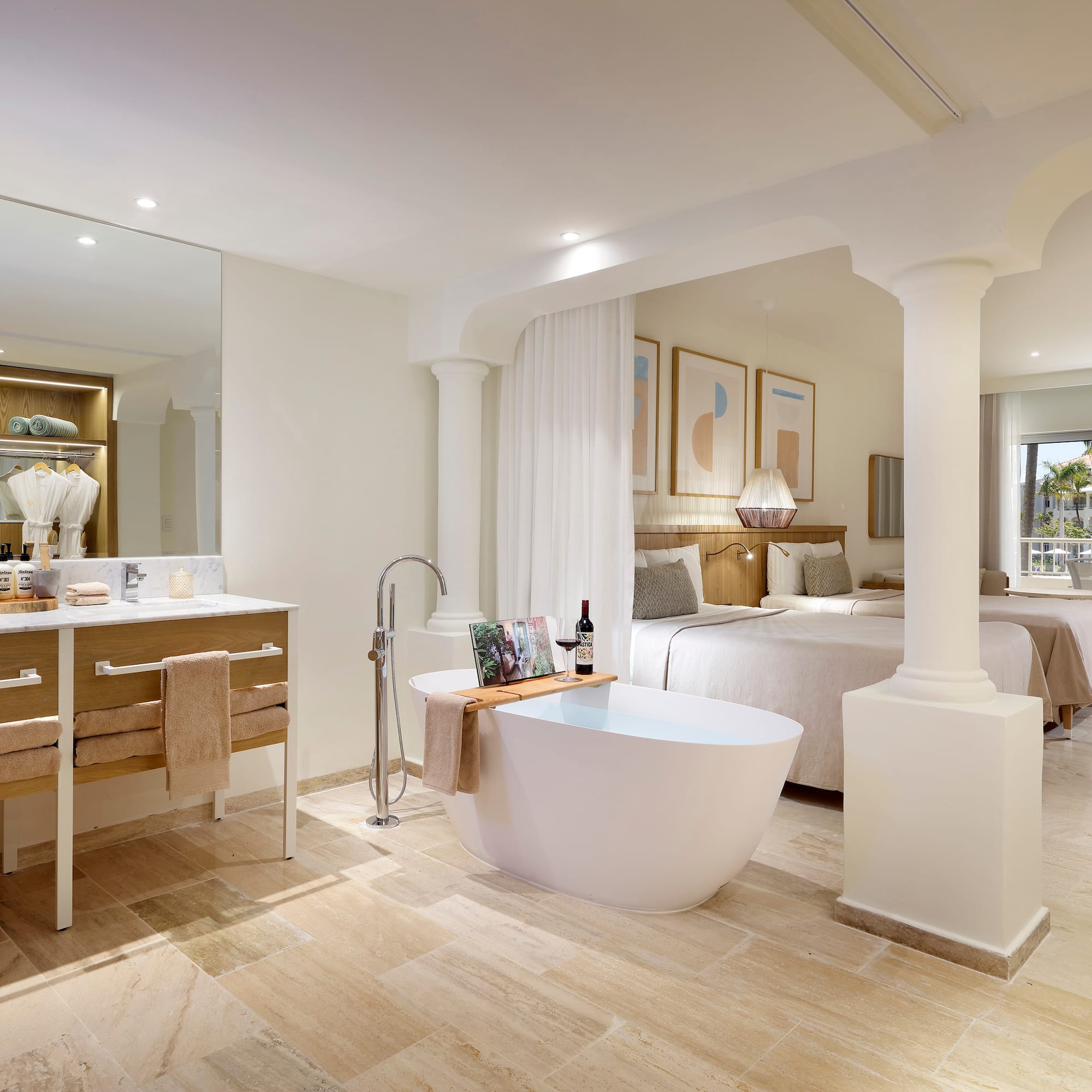 a bathroom with a tub and a sink
