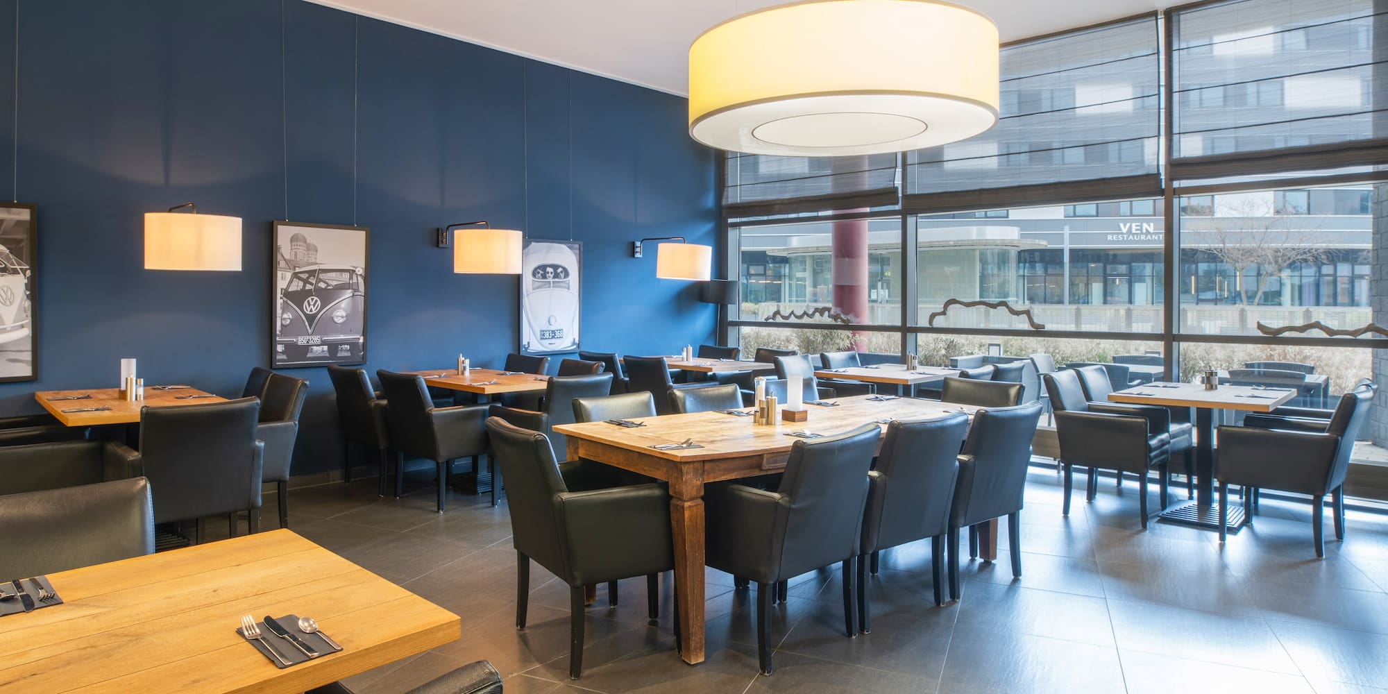 a restaurant with tables and chairs