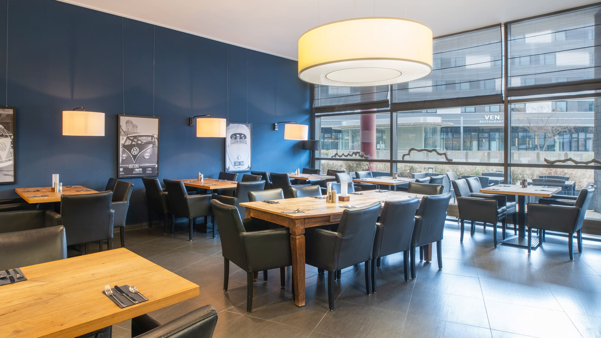 a restaurant with tables and chairs