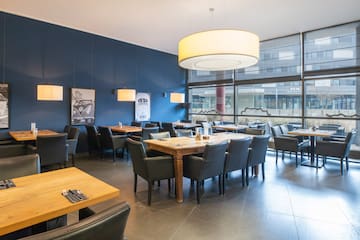 a restaurant with tables and chairs