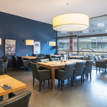 a restaurant with tables and chairs