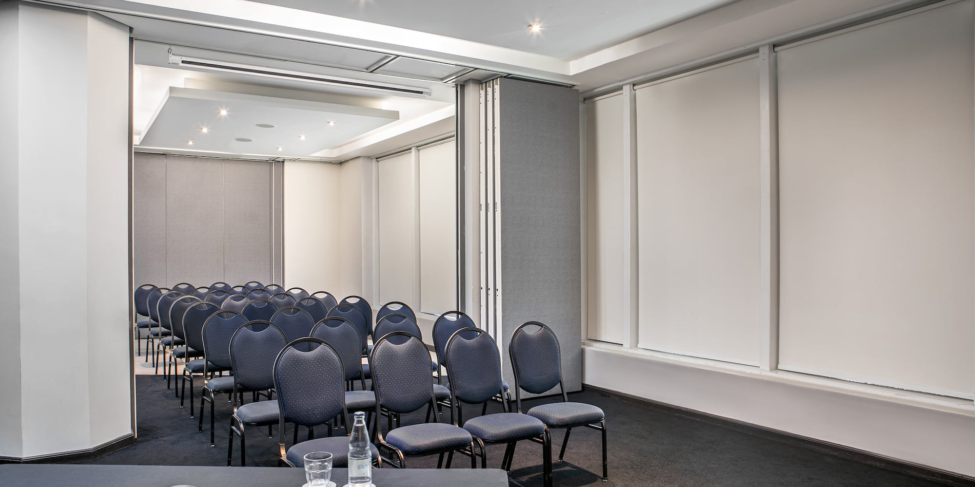 a room with chairs and a table