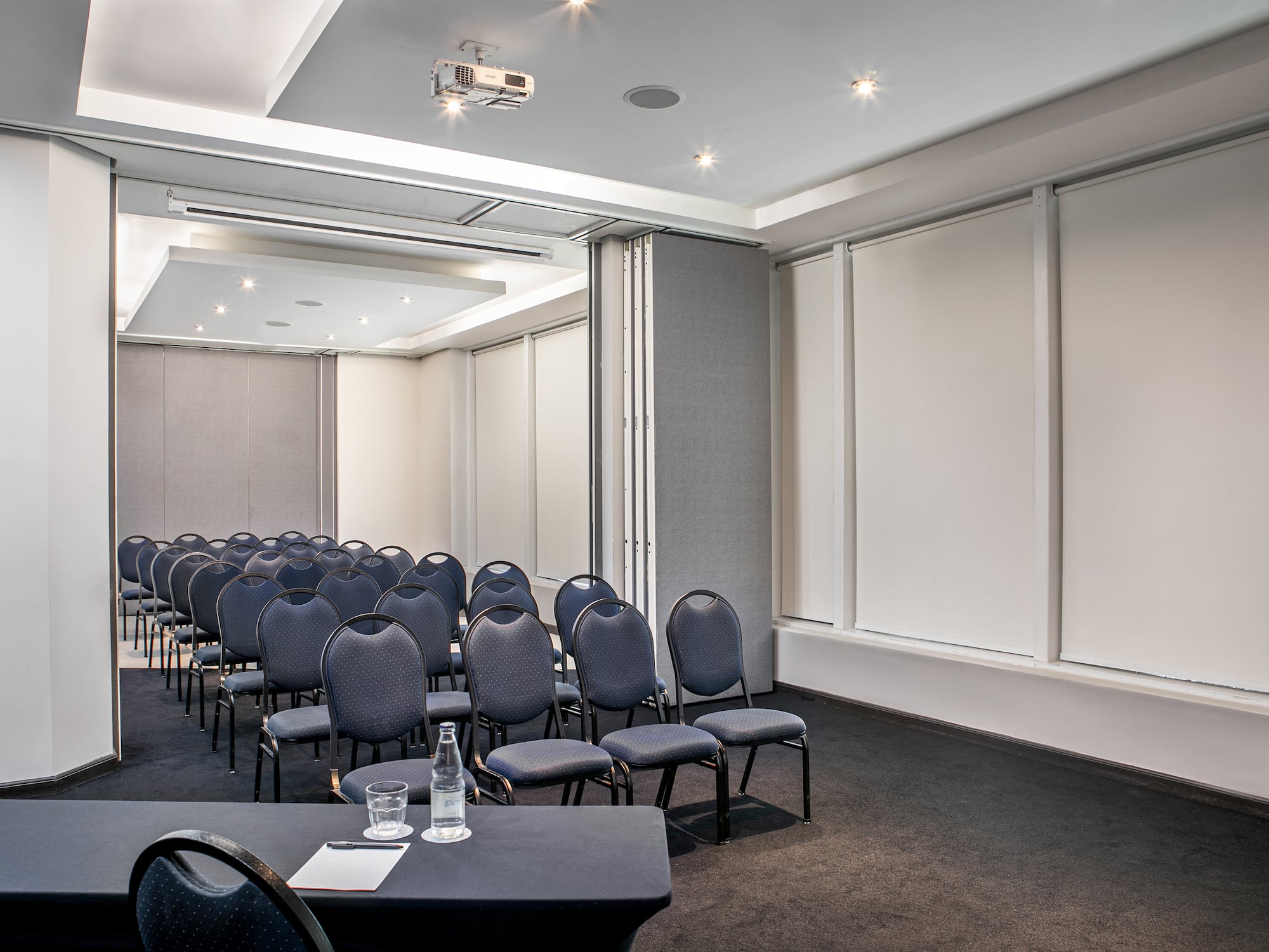 a room with chairs and a table