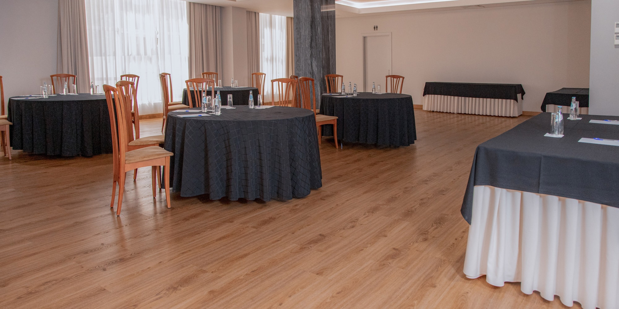 a room with tables and chairs