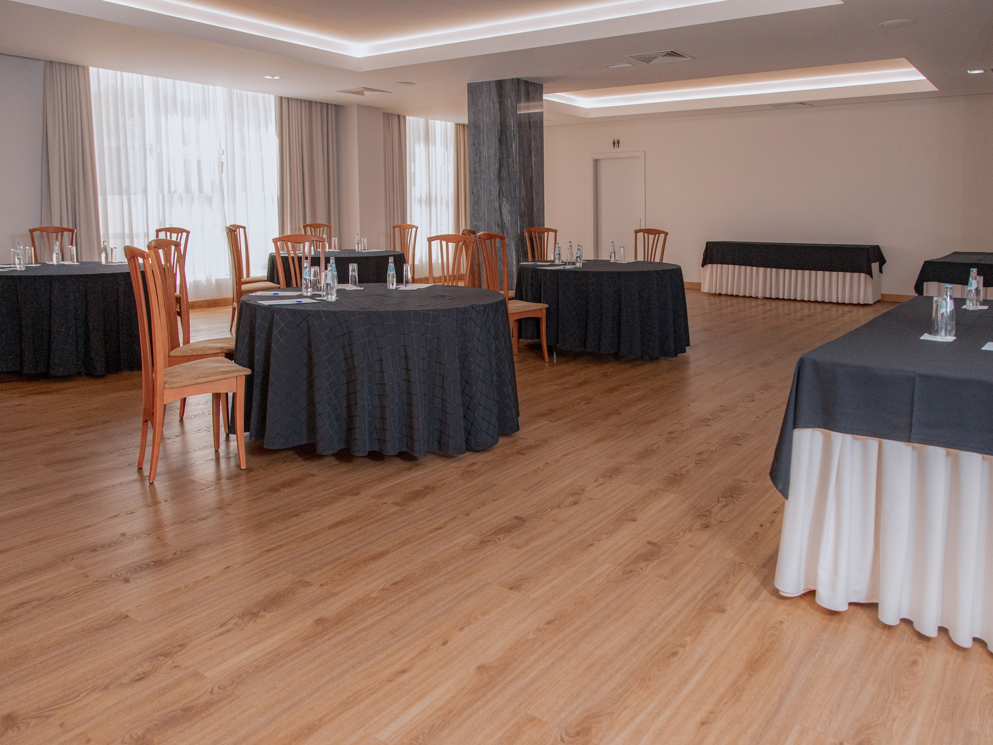 a room with tables and chairs