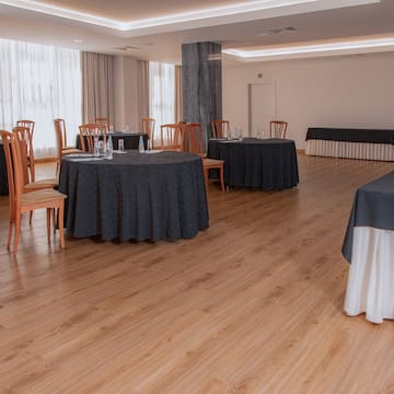 a room with tables and chairs