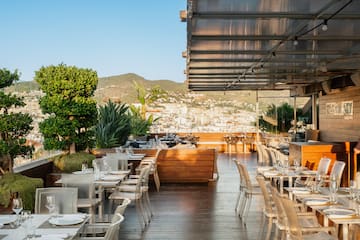 a restaurant with tables and chairs
