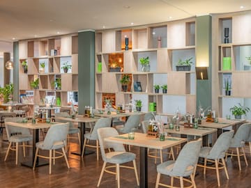 a room with tables and chairs