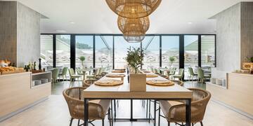 a room with a table and chairs